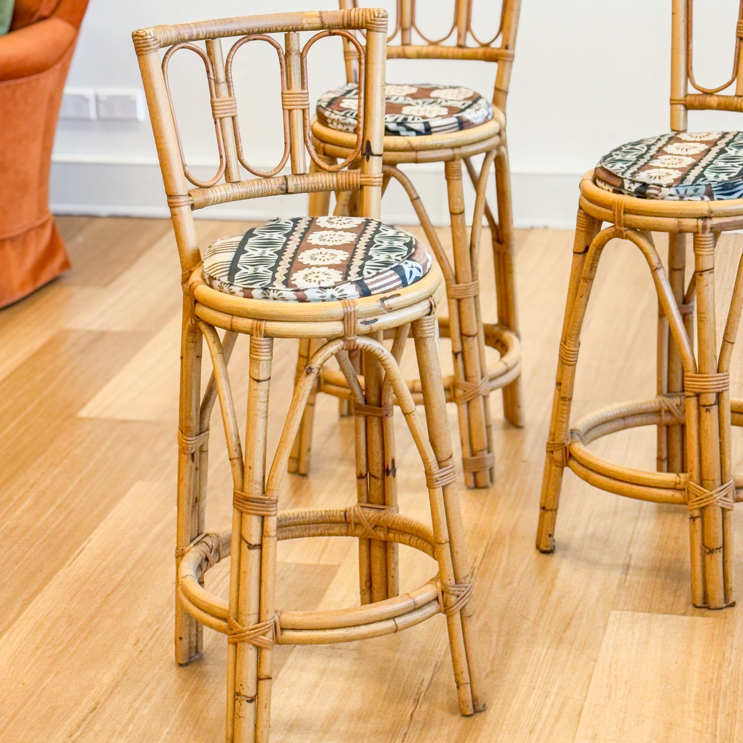 Set of three cane bar stools
