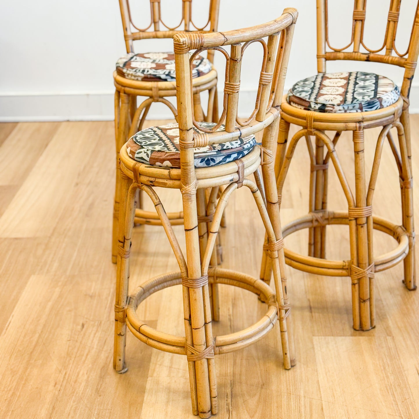 Set of three cane bar stools
