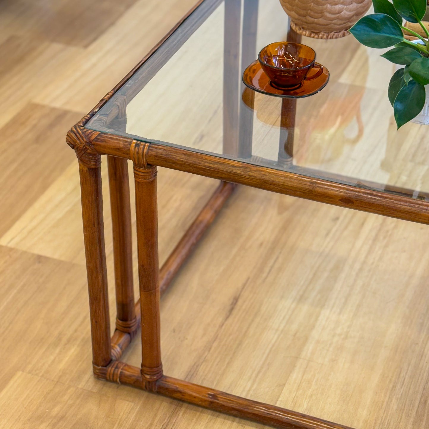 Vintage glass topped cane coffee tables
