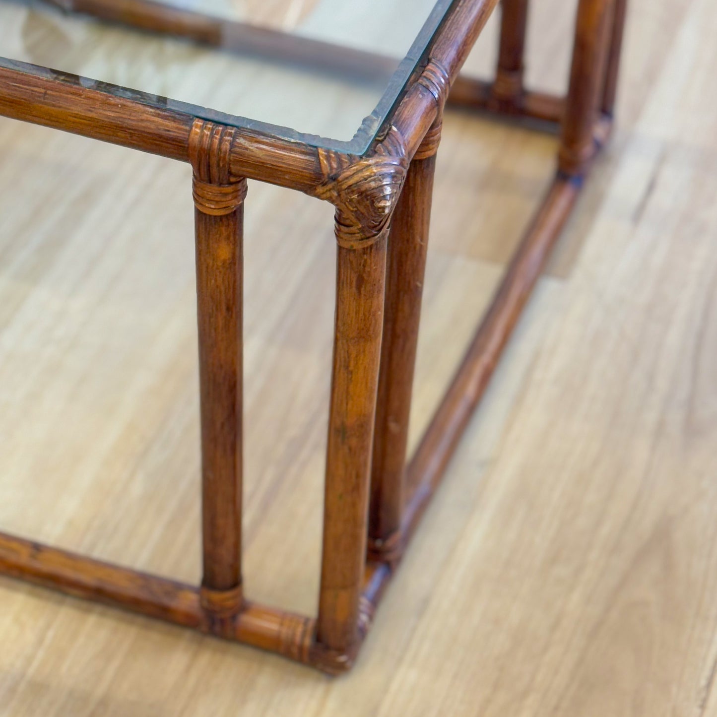 Vintage glass topped cane coffee tables