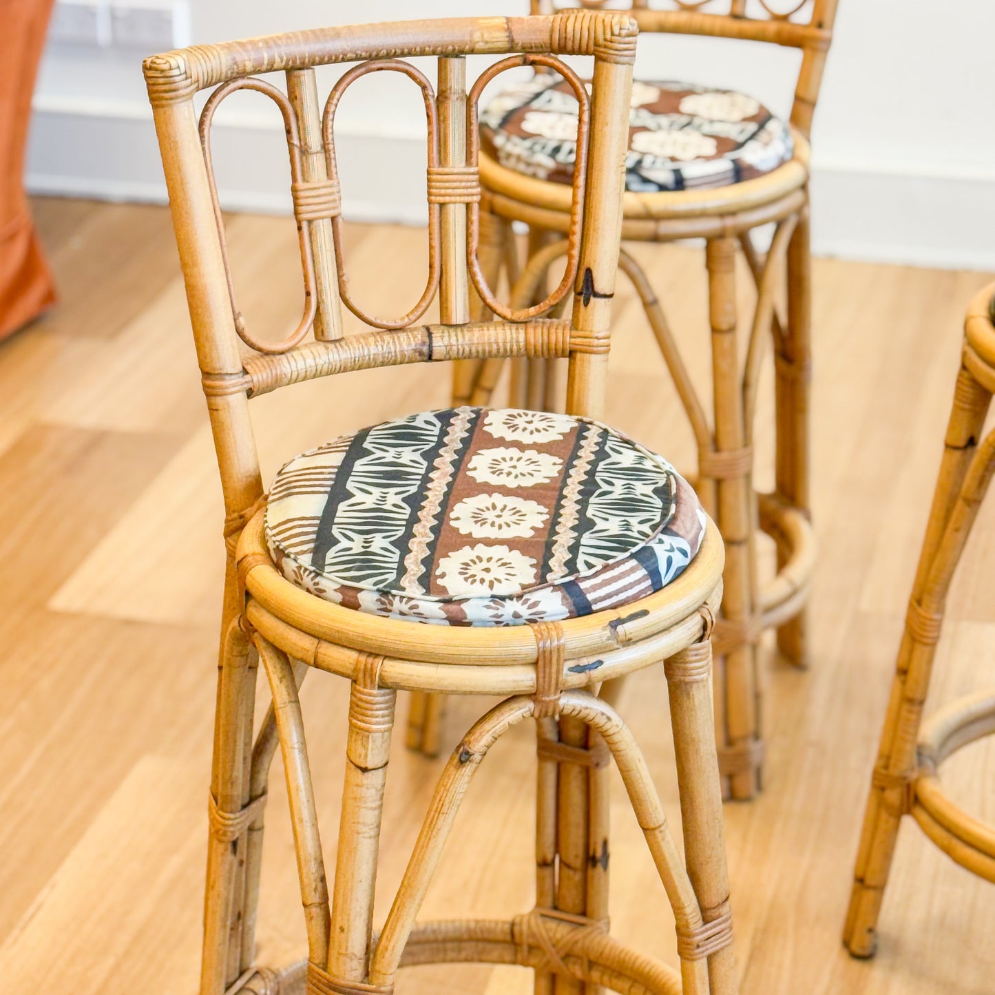 Set of three cane bar stools