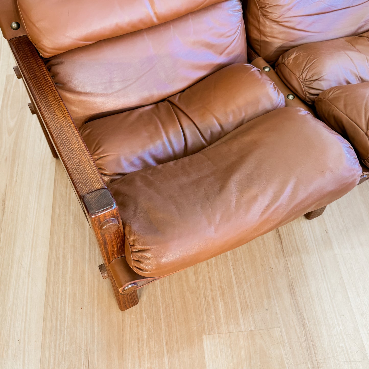 Norman Archibald 1970s ‘Nore’ vintage two seater leather sofa