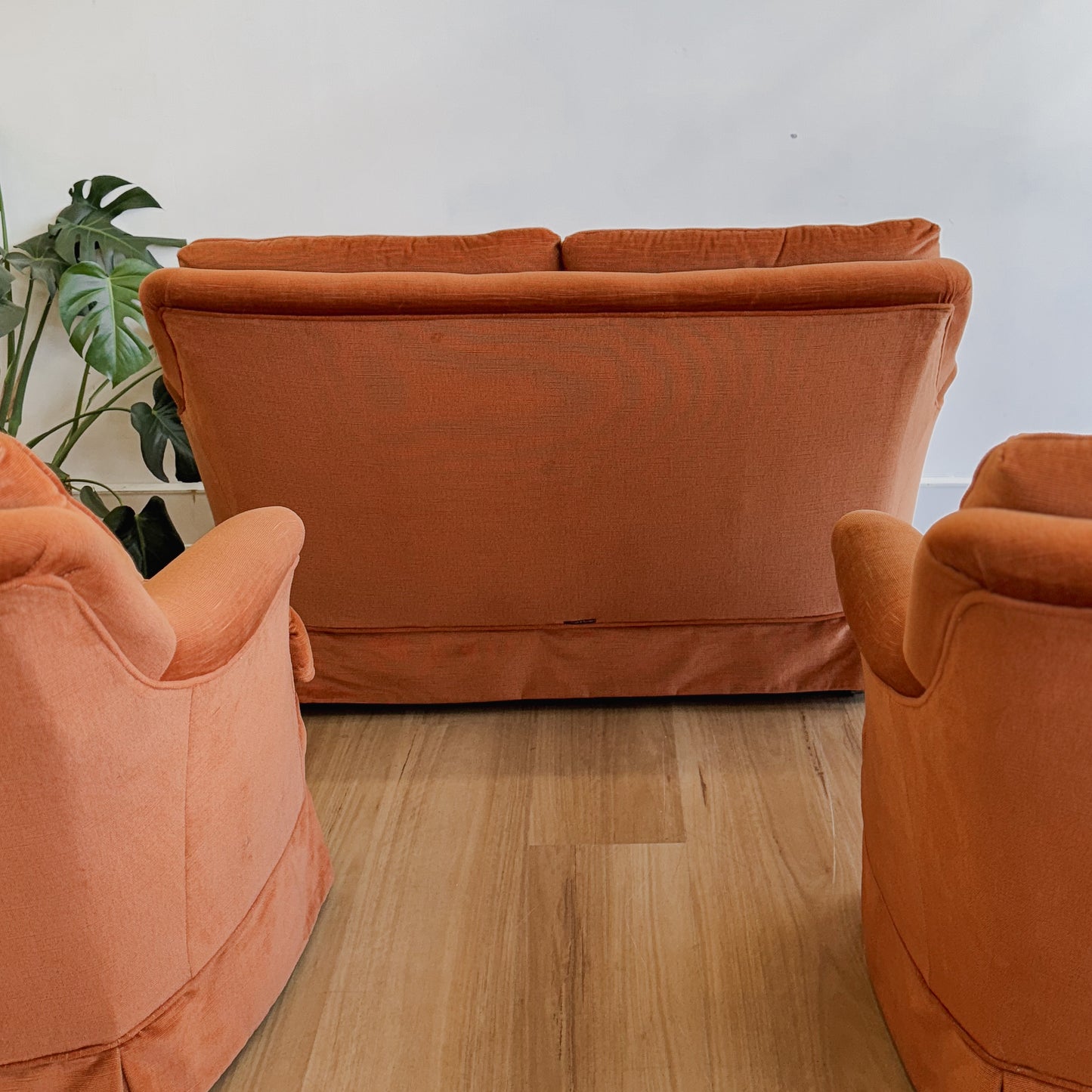 Three piece orange velvet Van Treight lounge suite