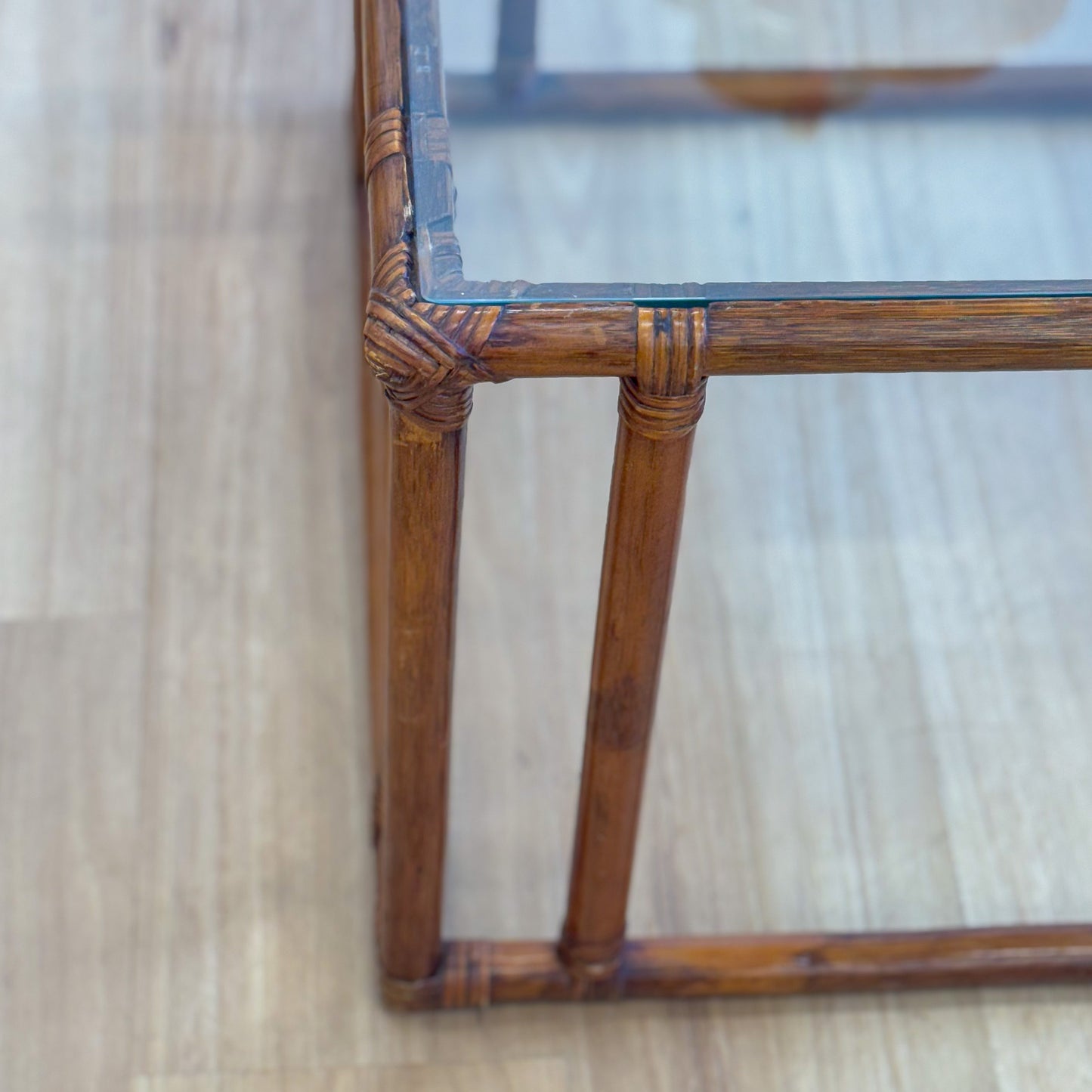 Vintage glass topped cane coffee tables