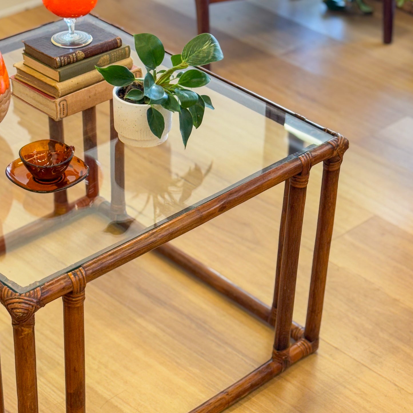 Vintage glass topped cane coffee tables
