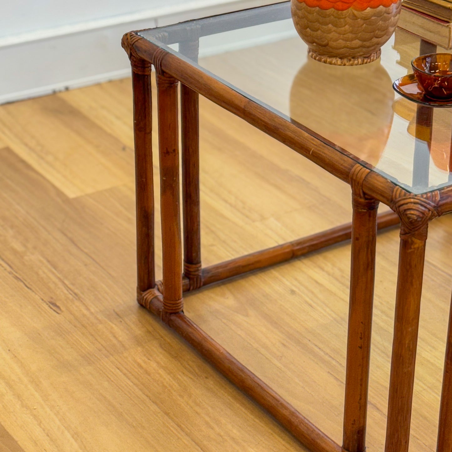 Vintage glass topped cane coffee tables