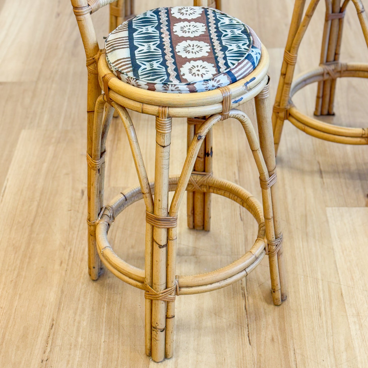 Set of three cane bar stools