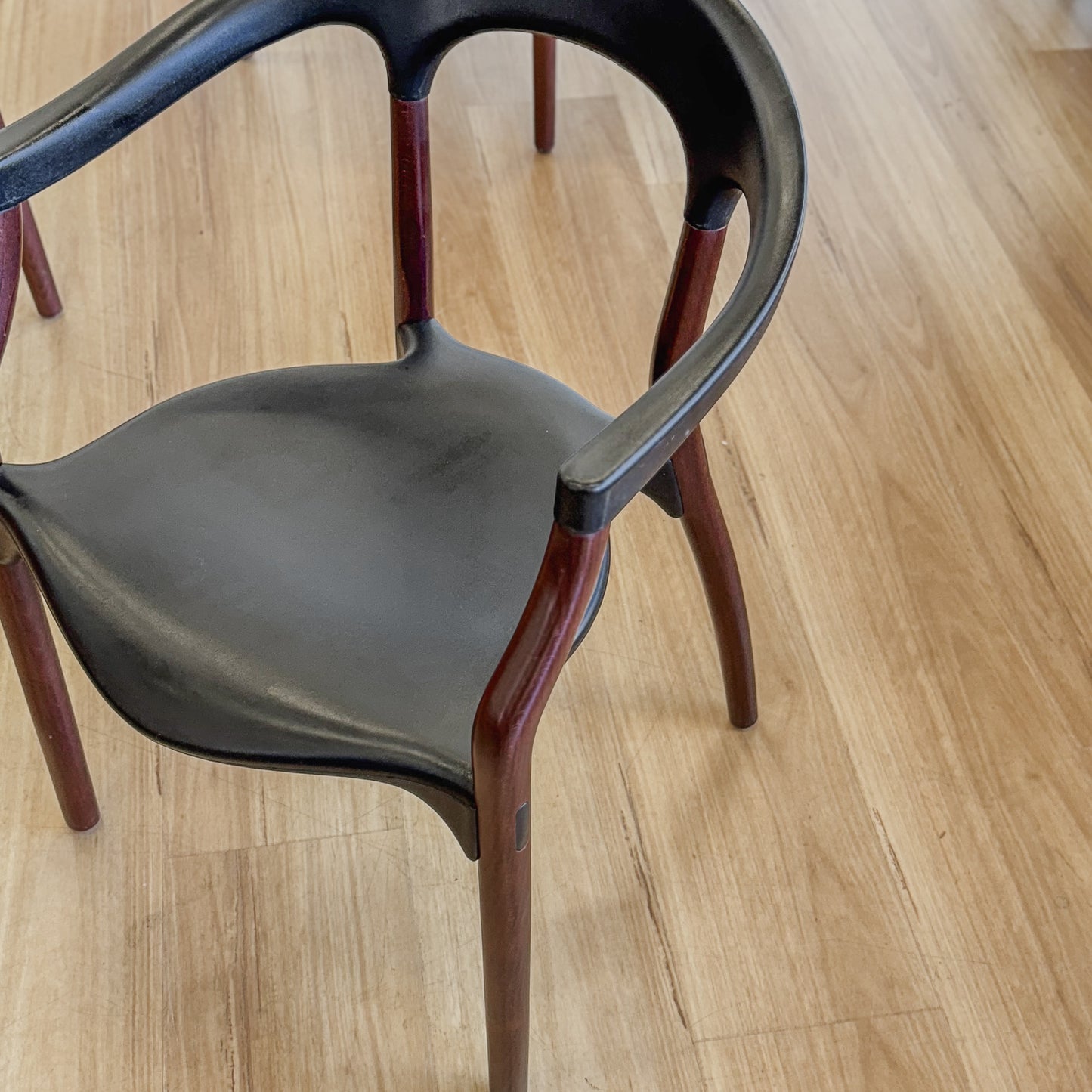 Set of four teak and acrylic dining chairs