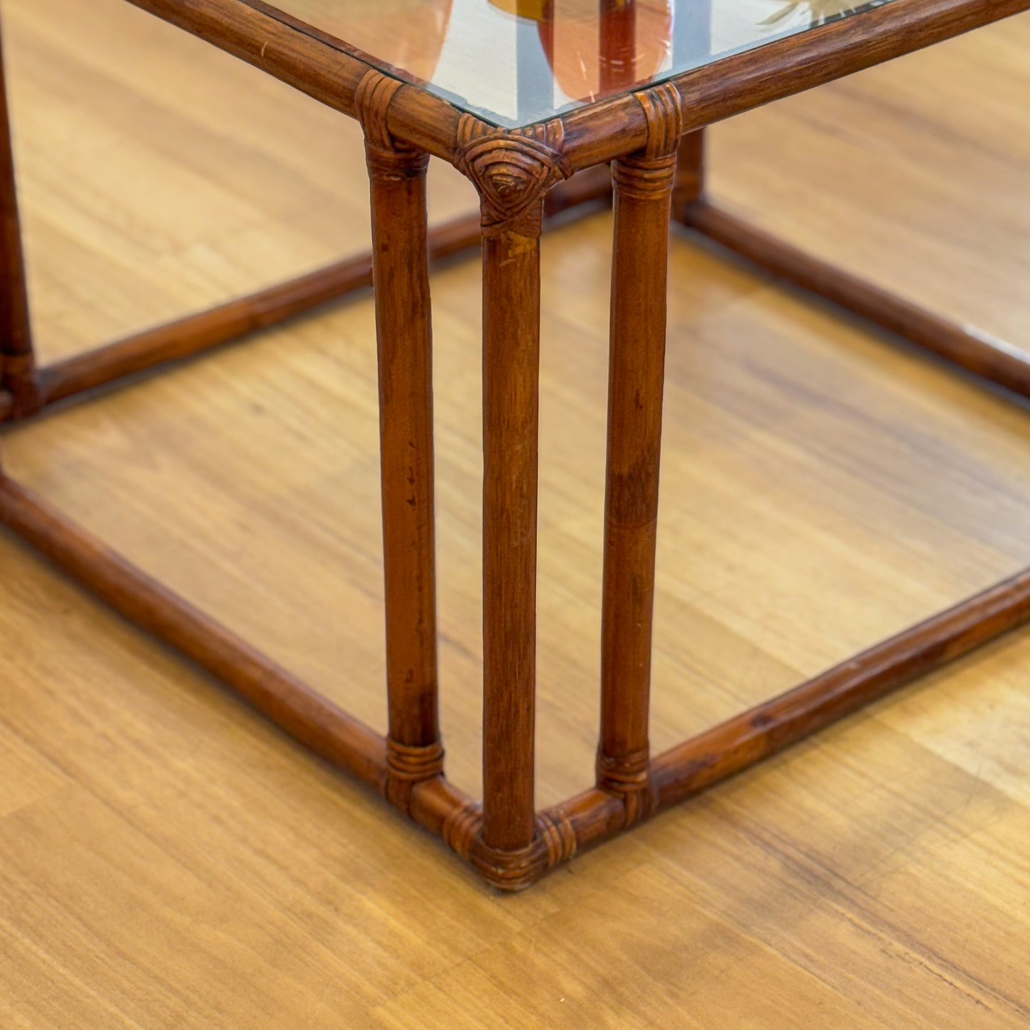Vintage glass topped cane coffee tables