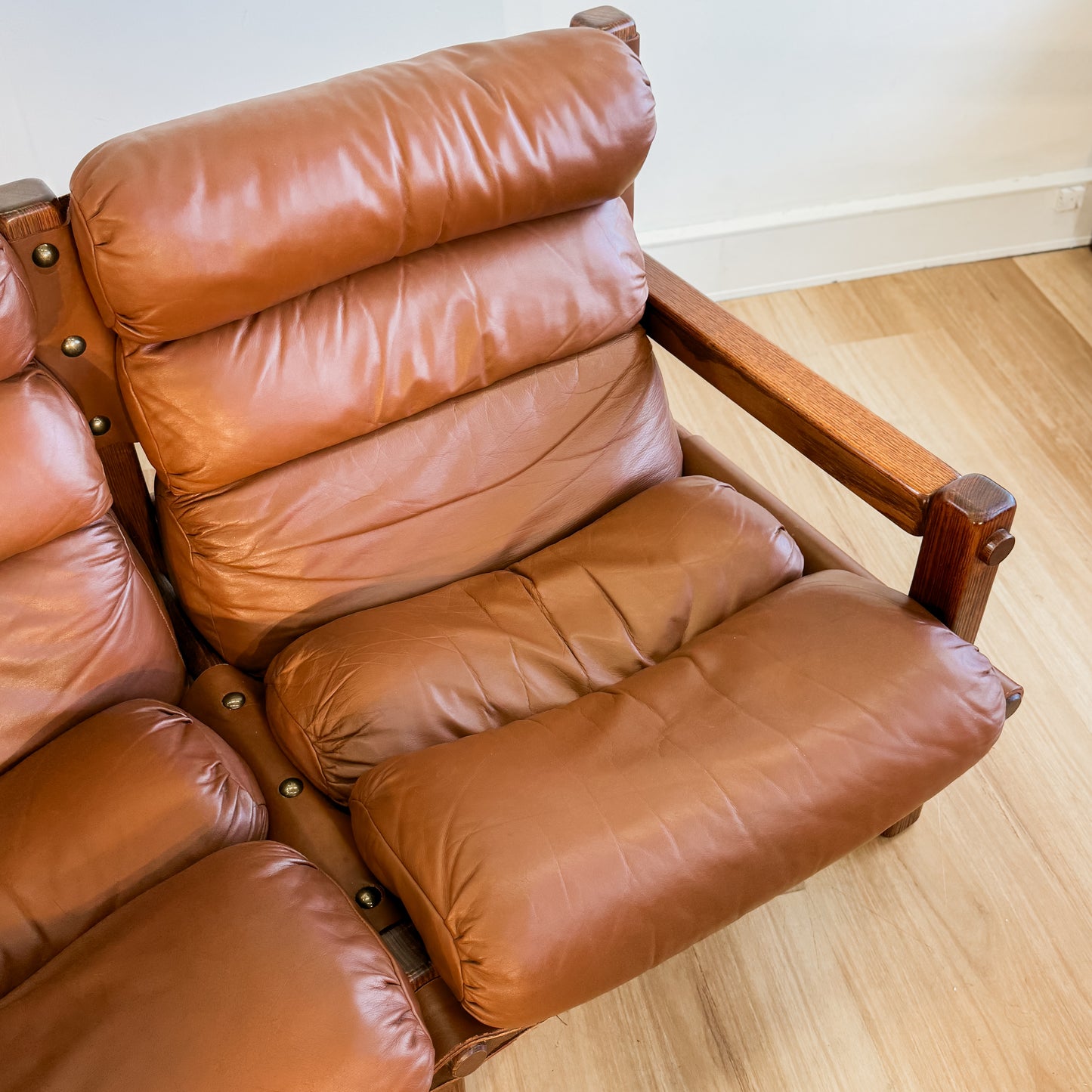 Norman Archibald 1970s ‘Nore’ vintage two seater leather sofa