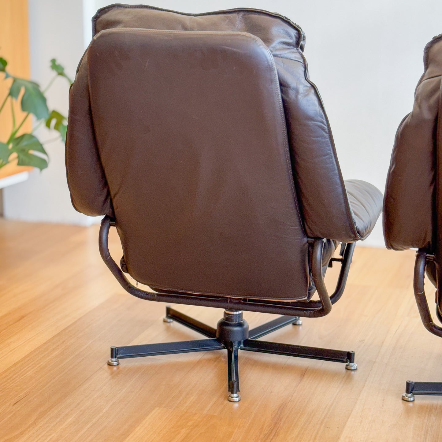 Skoghaug Industries - reclining swivel armchairs upholstered in khaki brown leather