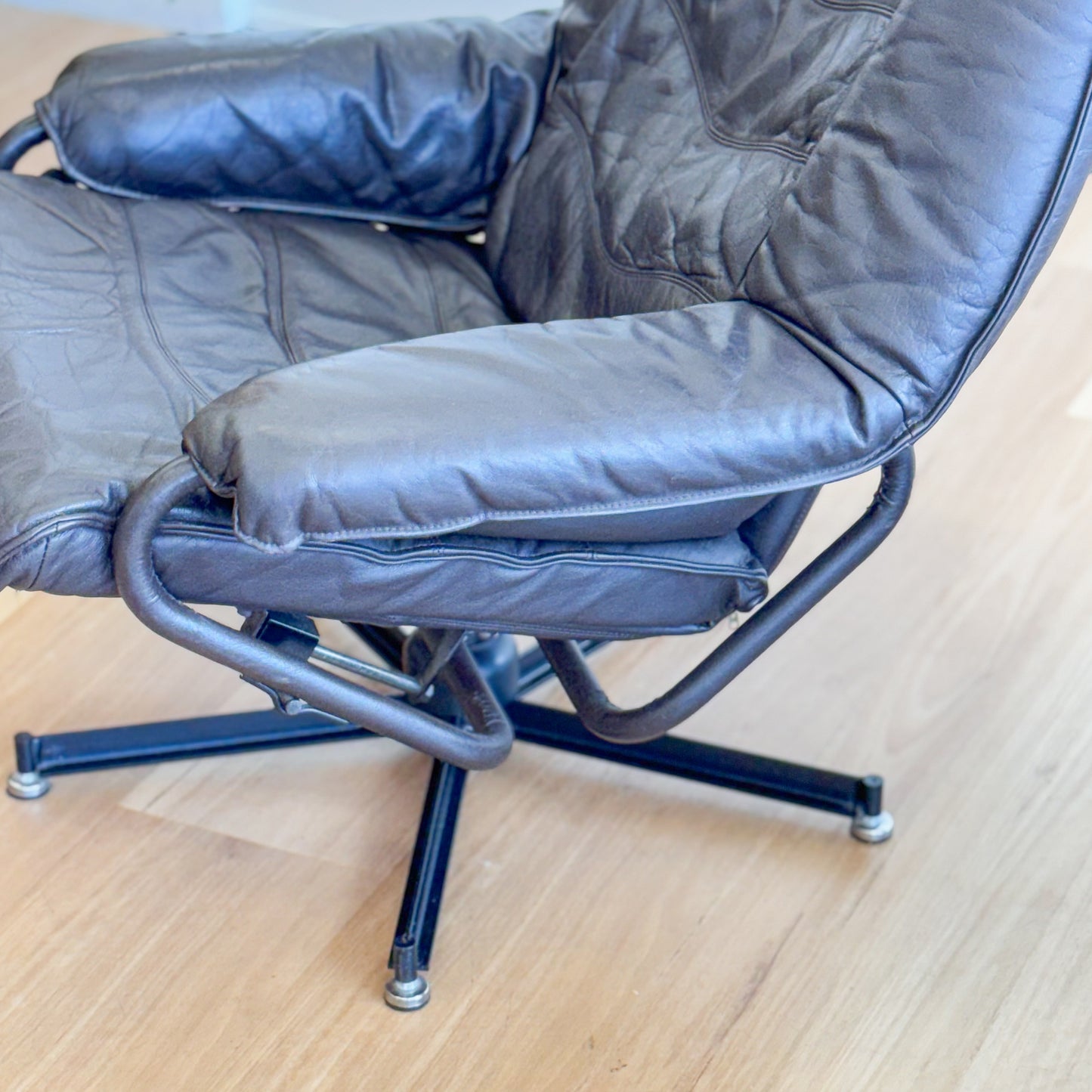 Skoghaug Industries - reclining swivel armchairs upholstered in khaki brown leather
