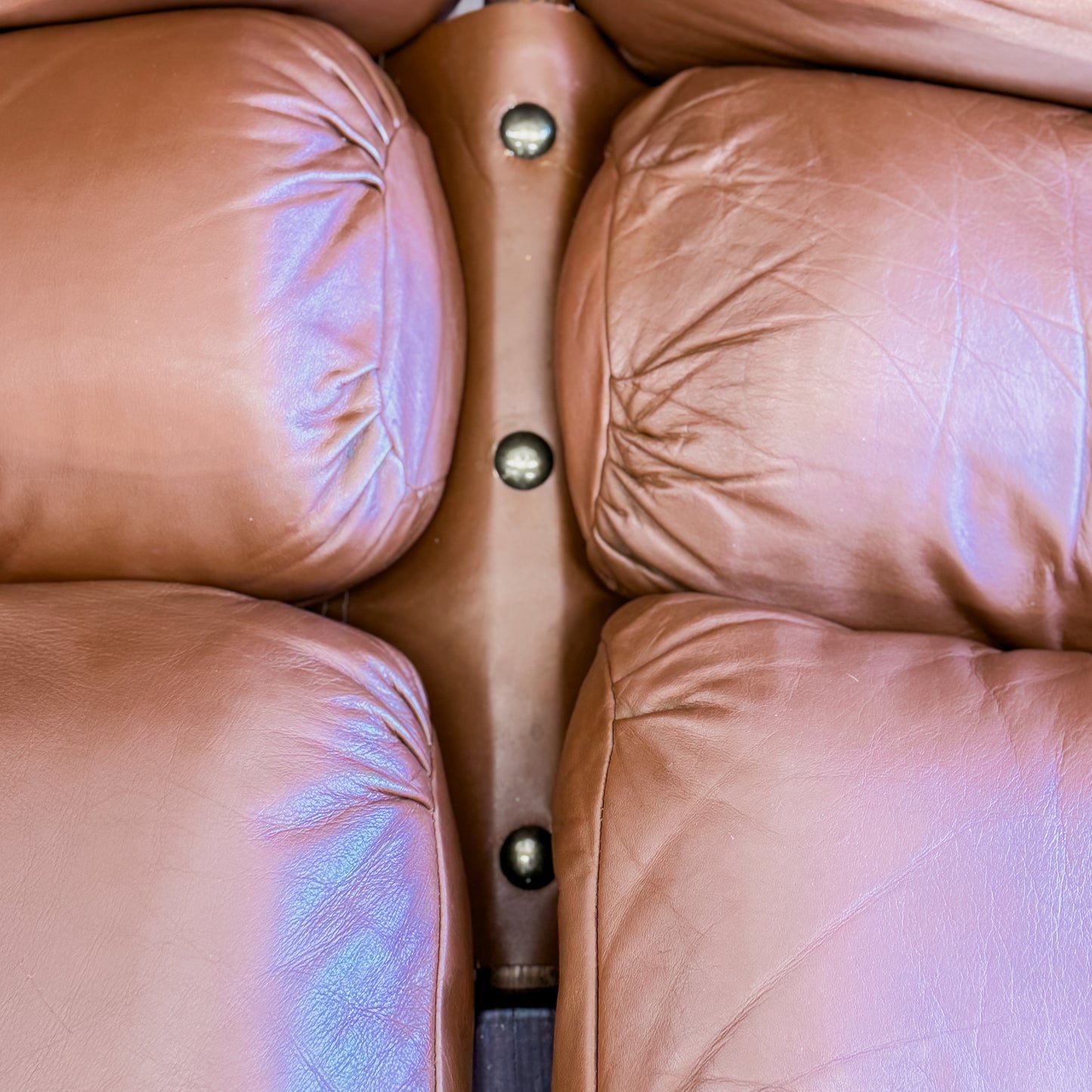 Norman Archibald 1970s ‘Nore’ vintage two seater leather sofa