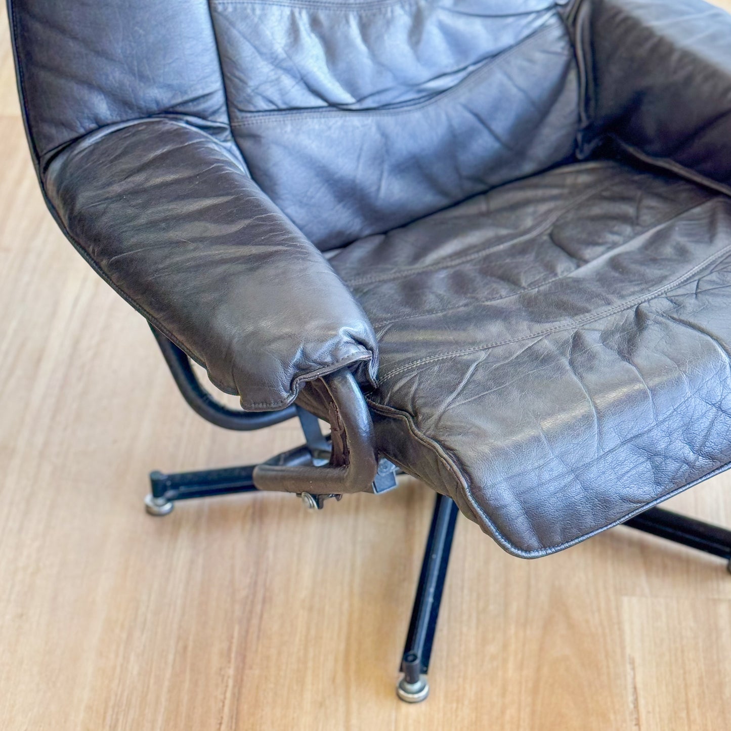 Skoghaug Industries - reclining swivel armchairs upholstered in khaki brown leather