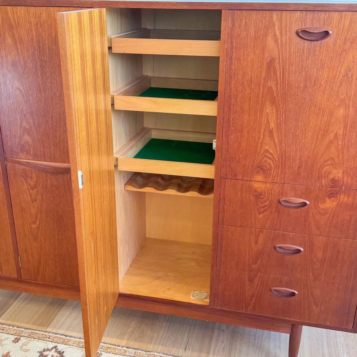 Circa 1960s Chiswell Wave Handle cabinet