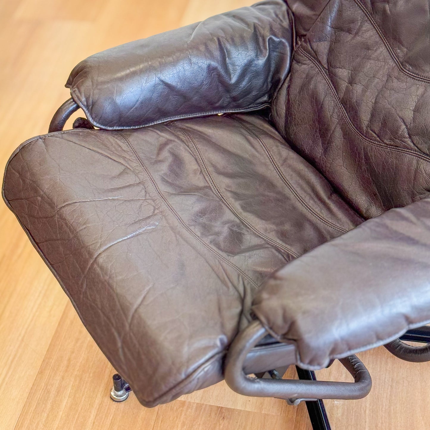 Skoghaug Industries - reclining swivel armchairs upholstered in khaki brown leather