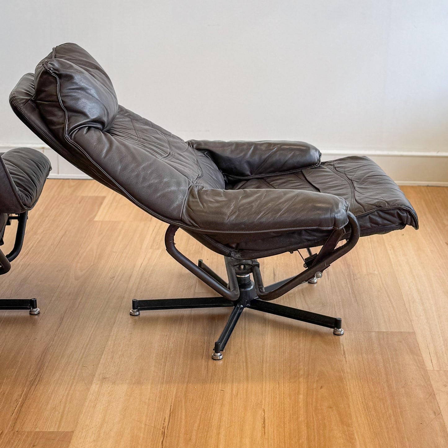 Skoghaug Industries - reclining swivel armchairs upholstered in khaki brown leather
