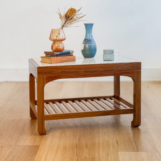 Stone top coffee table with slatted shelf underneath
