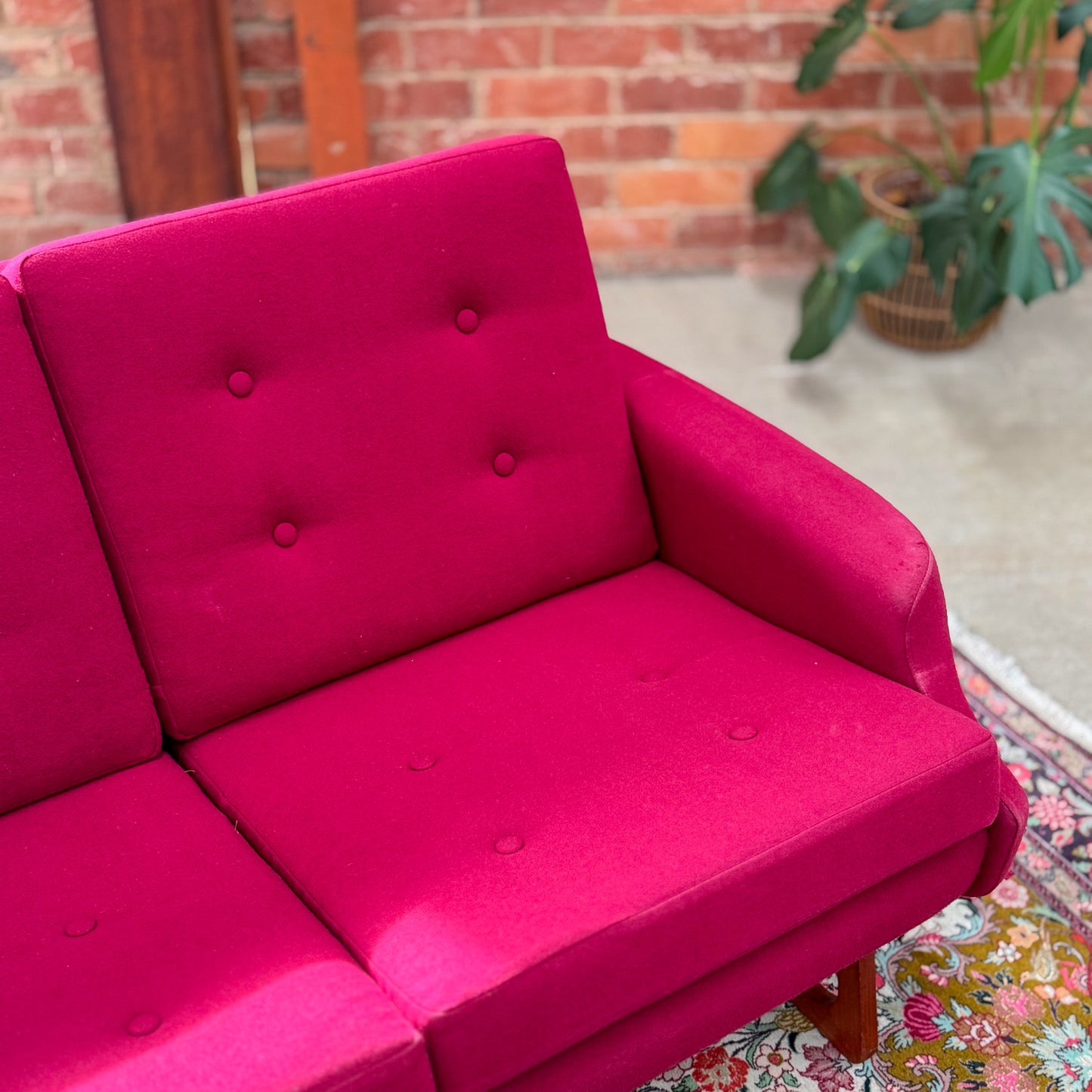 1960s Parker two seater sofa on a sleigh base with exposed dowel detail