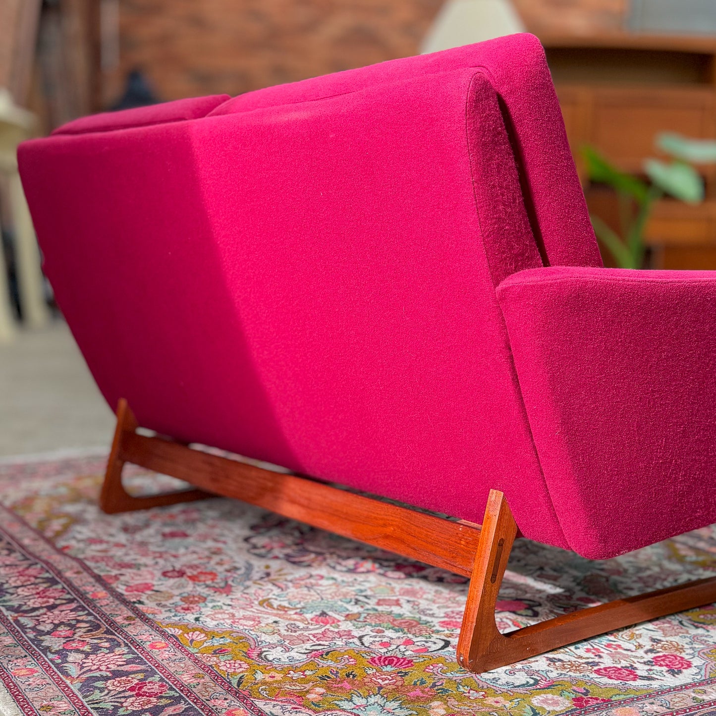 1960s Parker two seater sofa on a sleigh base with exposed dowel detail