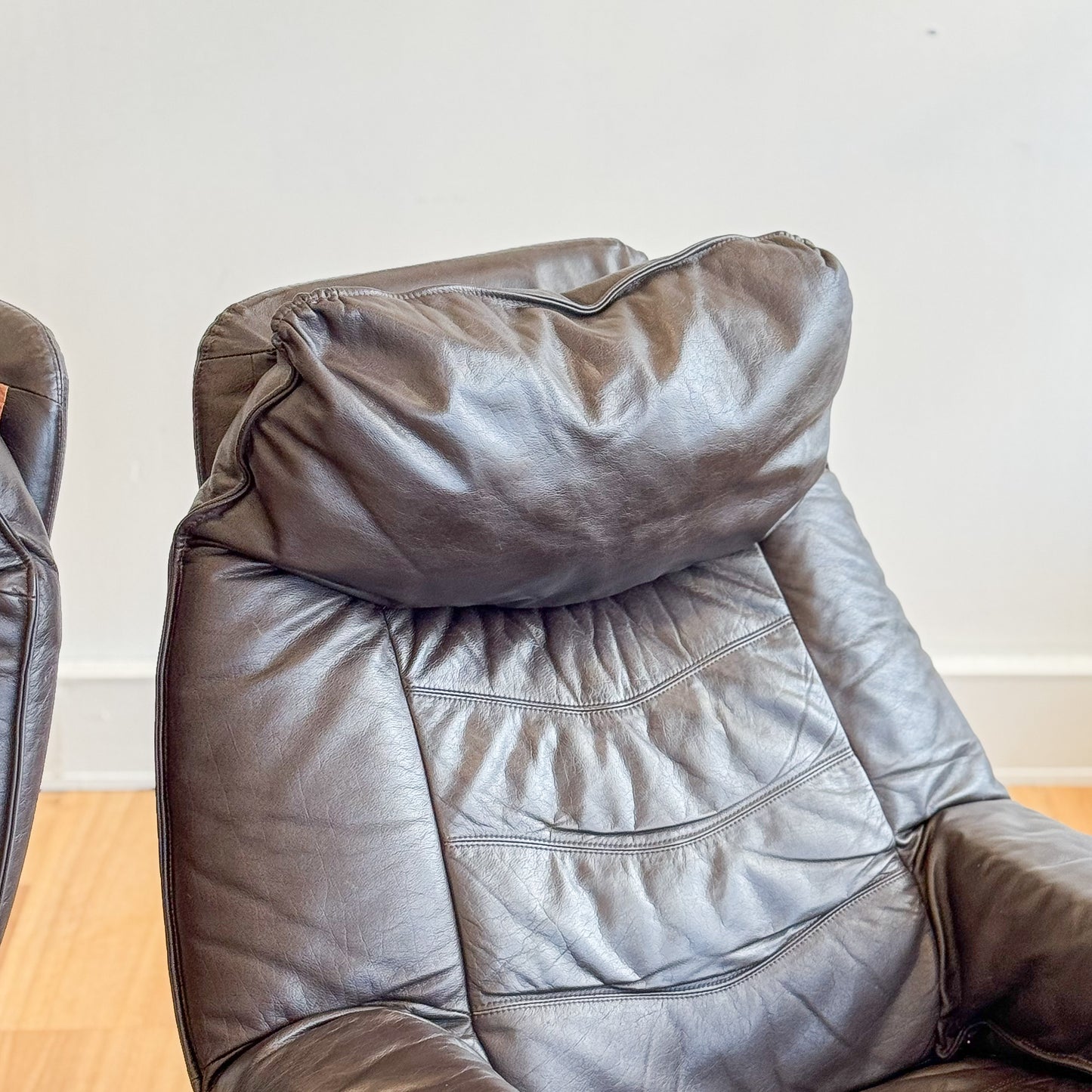 Skoghaug Industries - reclining swivel armchairs upholstered in khaki brown leather