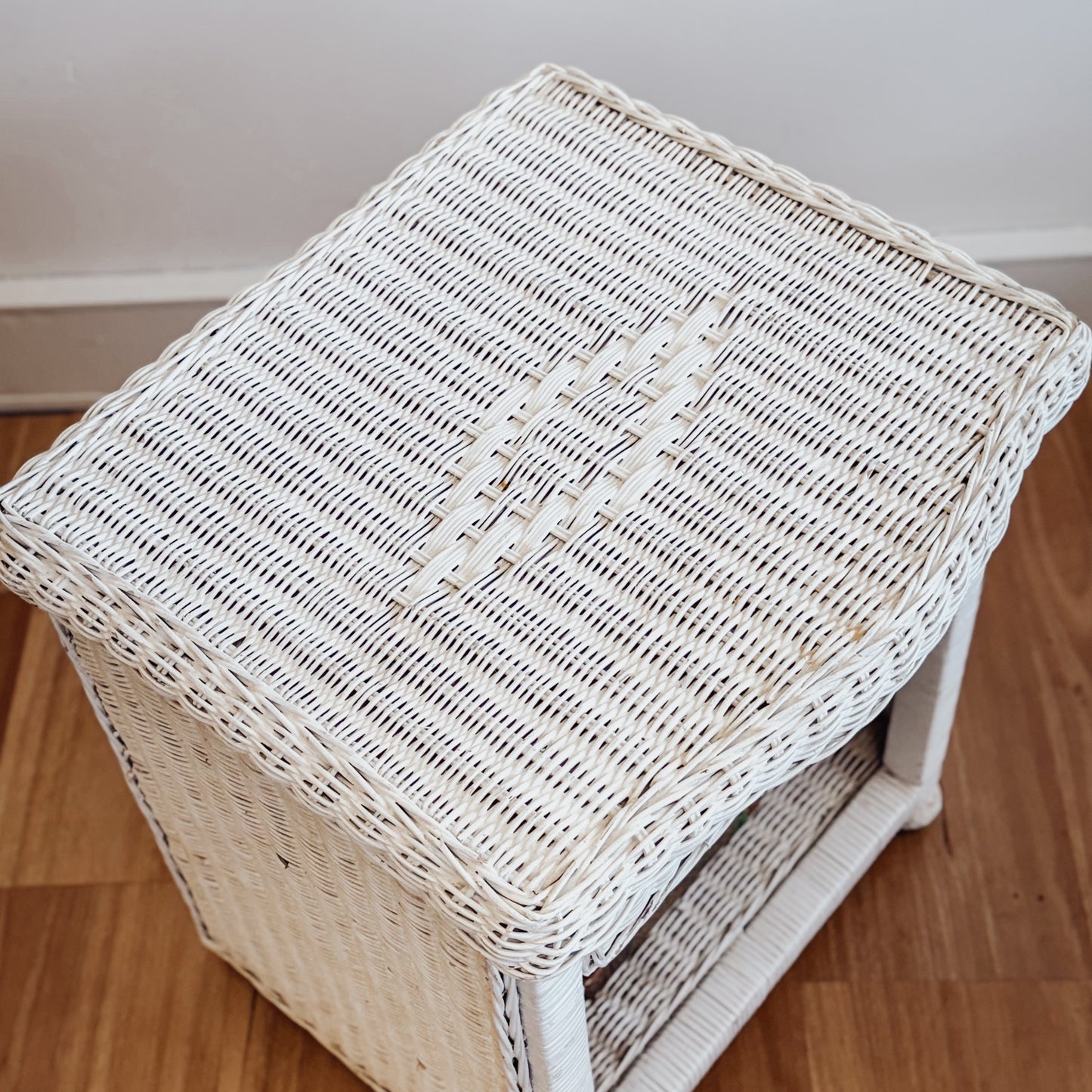 Vintage white painted cane bedside table