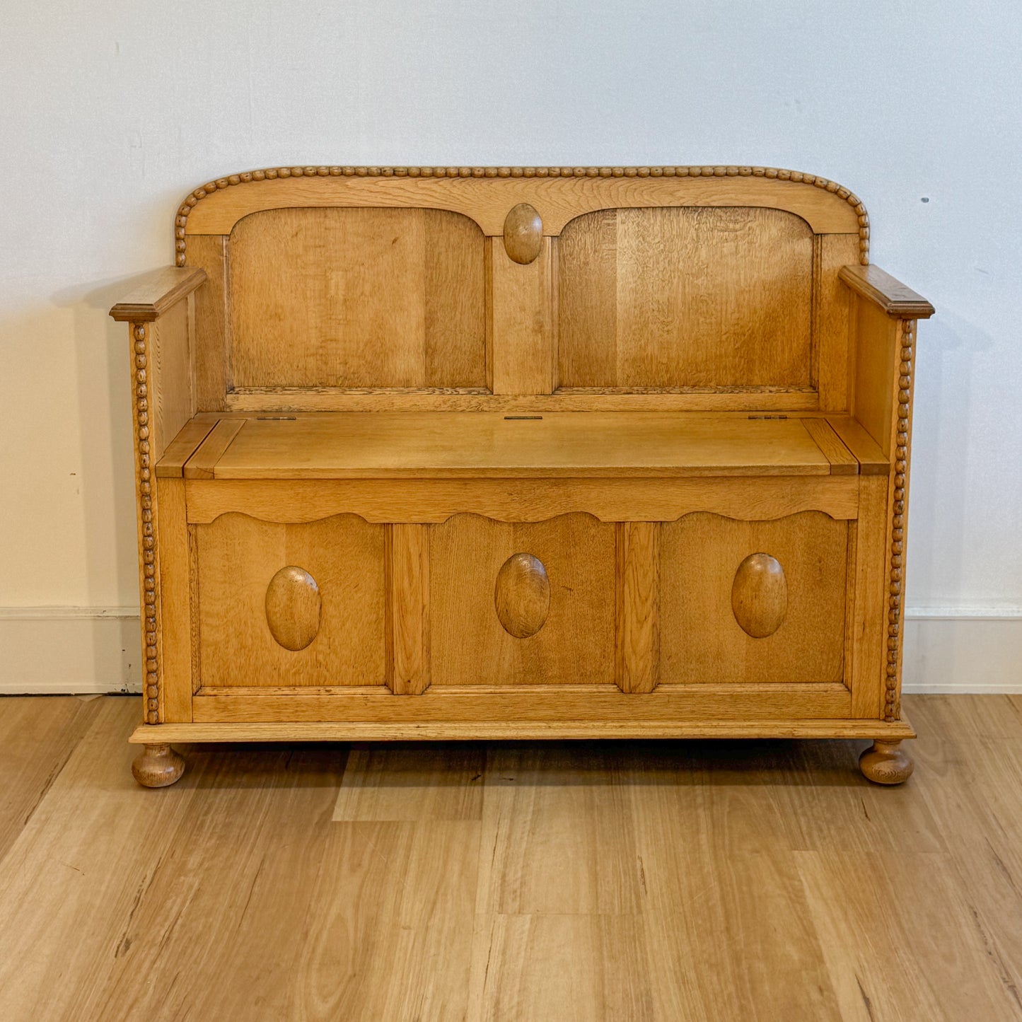 A near antique silky oak hall settee bench with storage