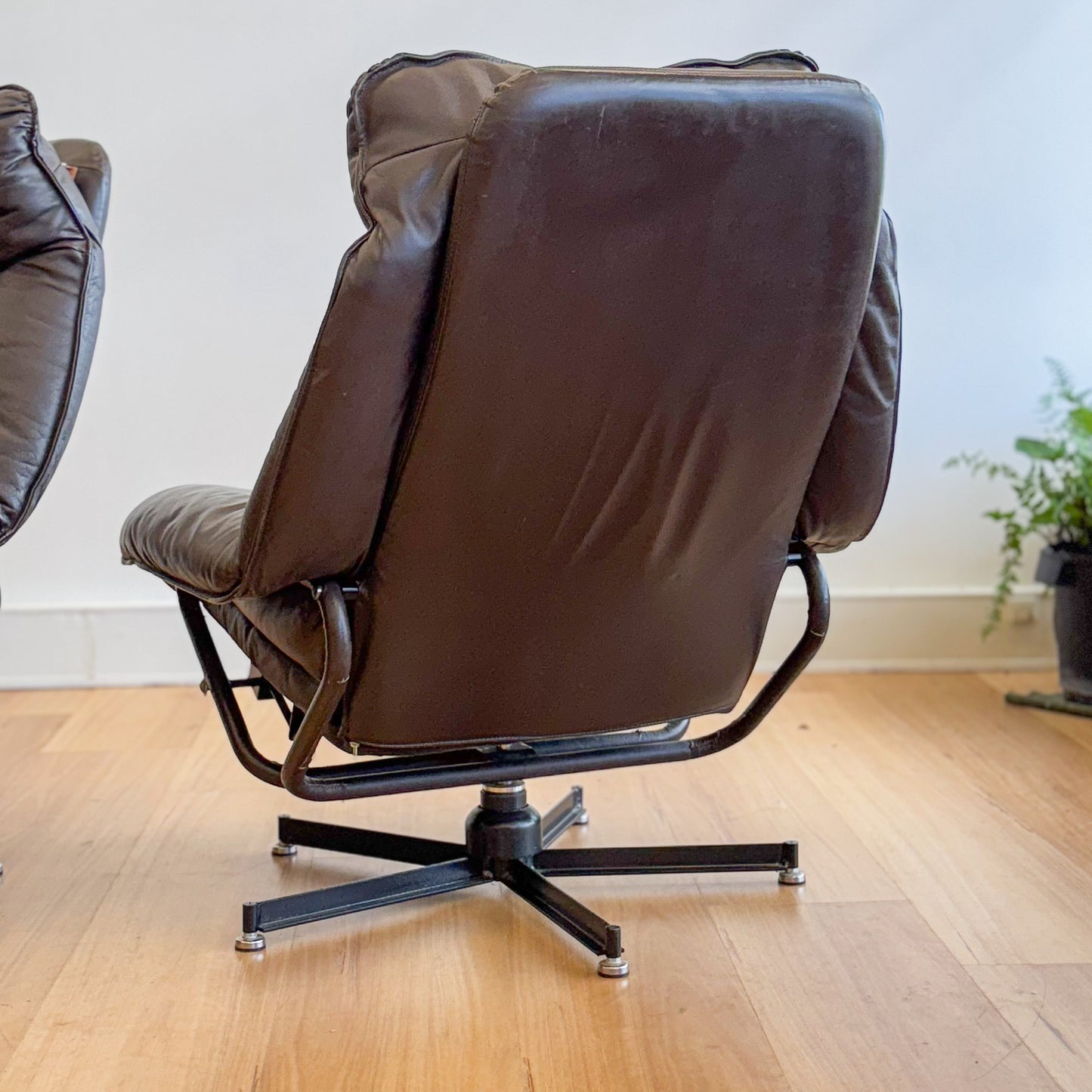 Skoghaug Industries - reclining swivel armchairs upholstered in khaki brown leather