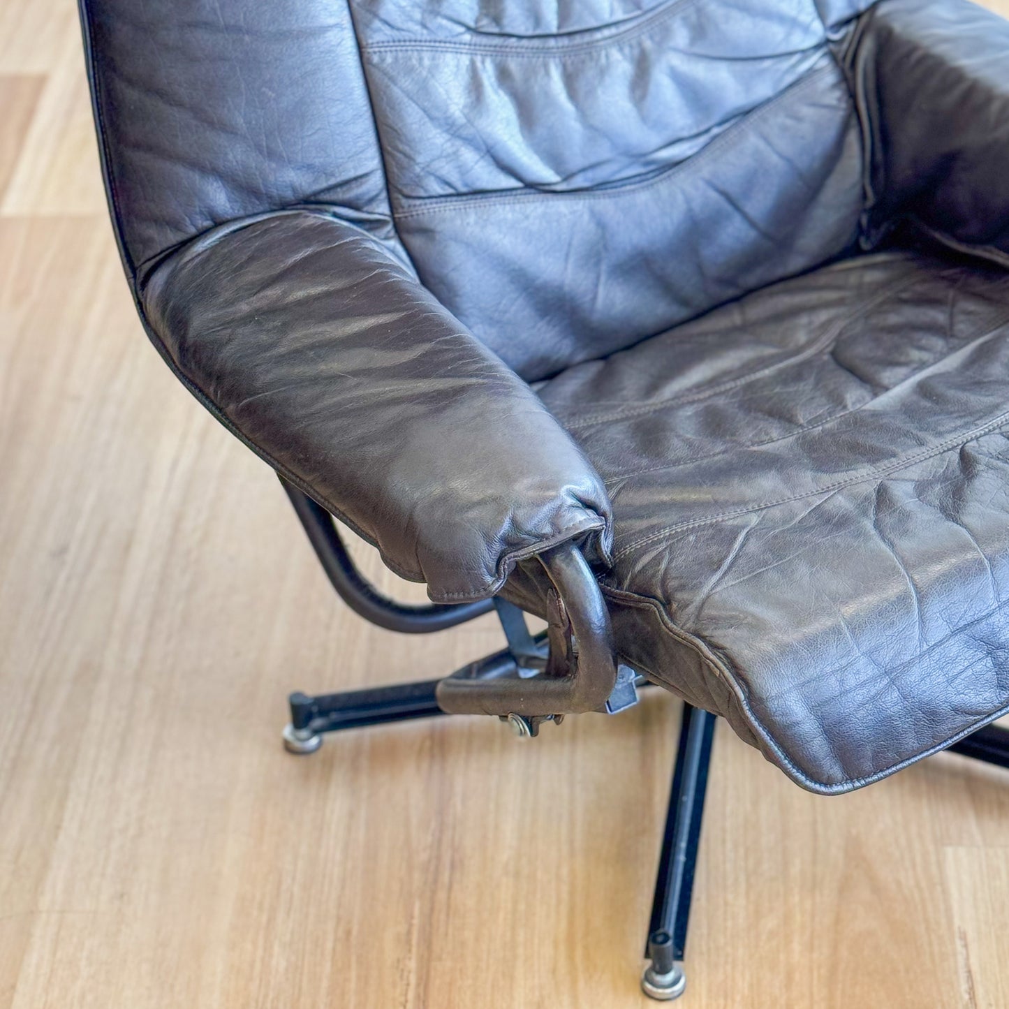 Skoghaug Industries - reclining swivel armchairs upholstered in khaki brown leather
