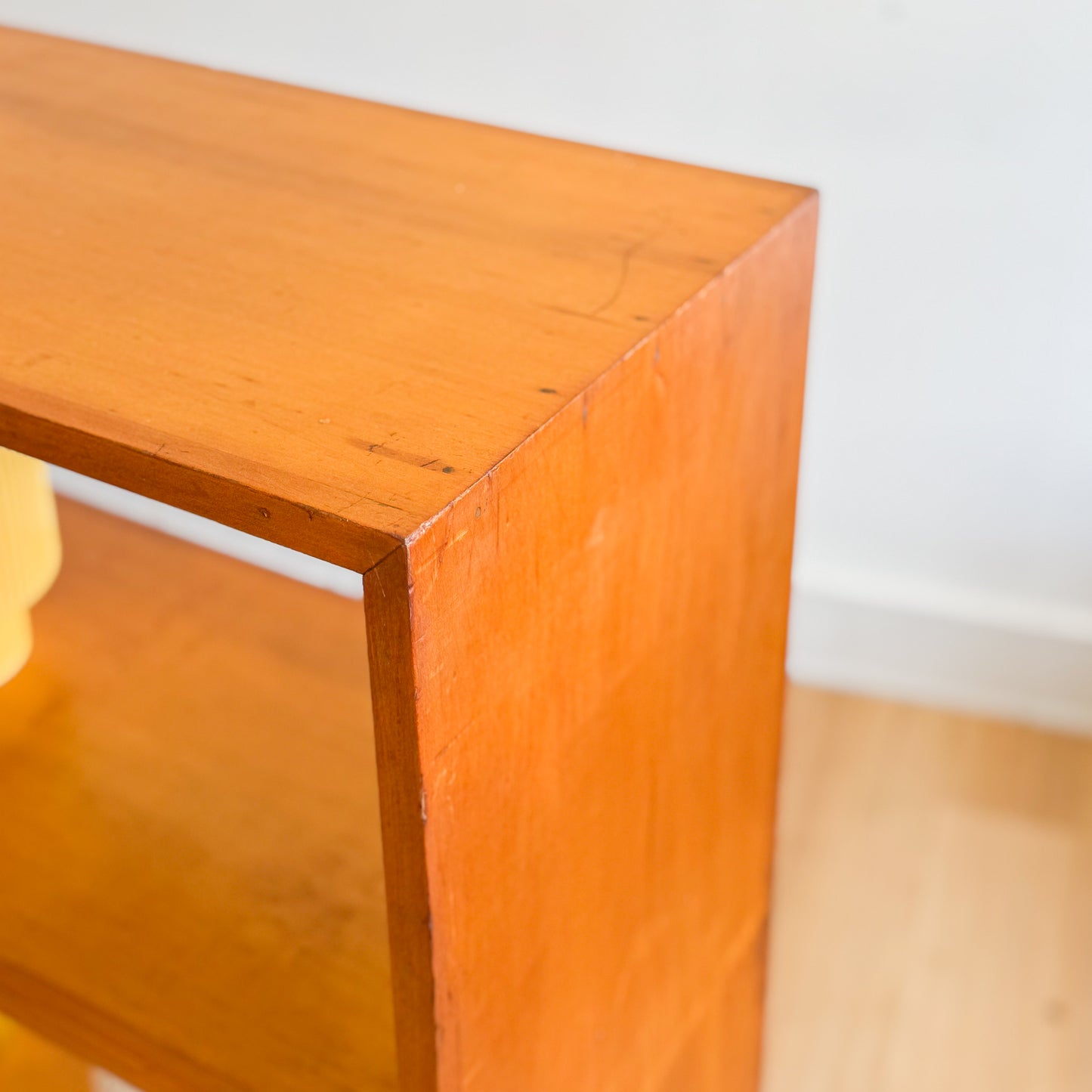Mid century pigeonhole bookshelf on cigar legs