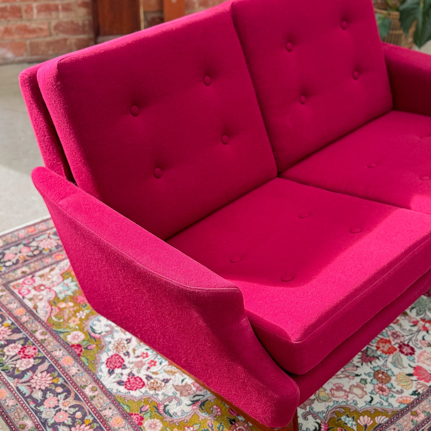 1960s Parker two seater sofa on a sleigh base with exposed dowel detail