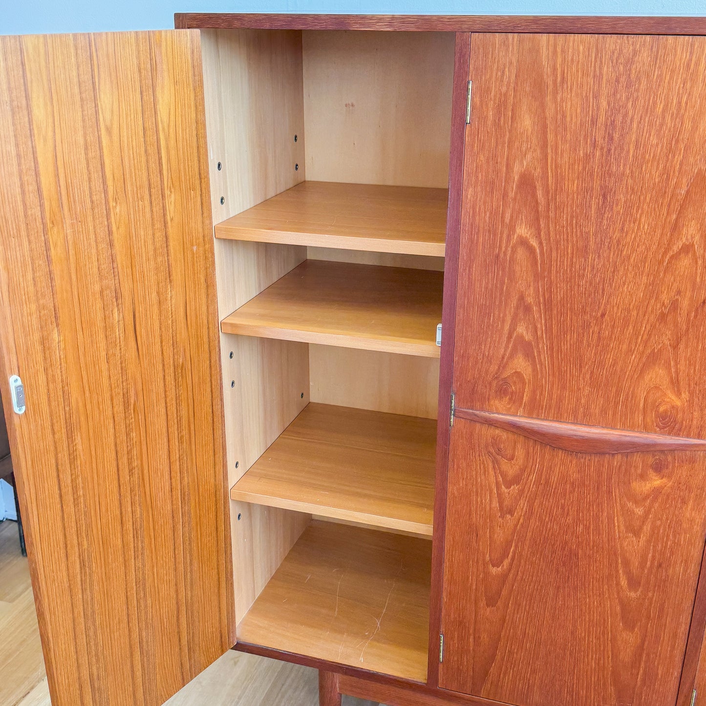 Circa 1960s Chiswell Wave Handle cabinet