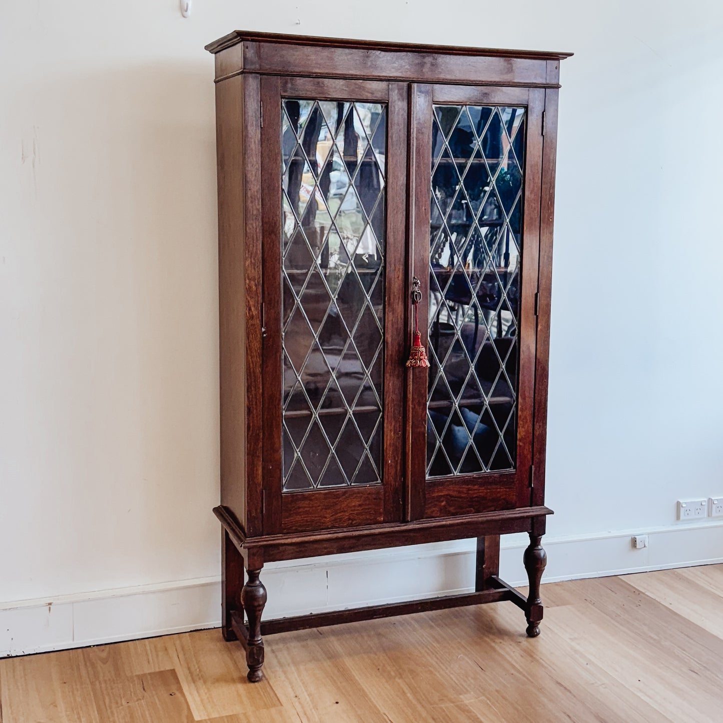 1930s oak & leadlight two-door bookcase