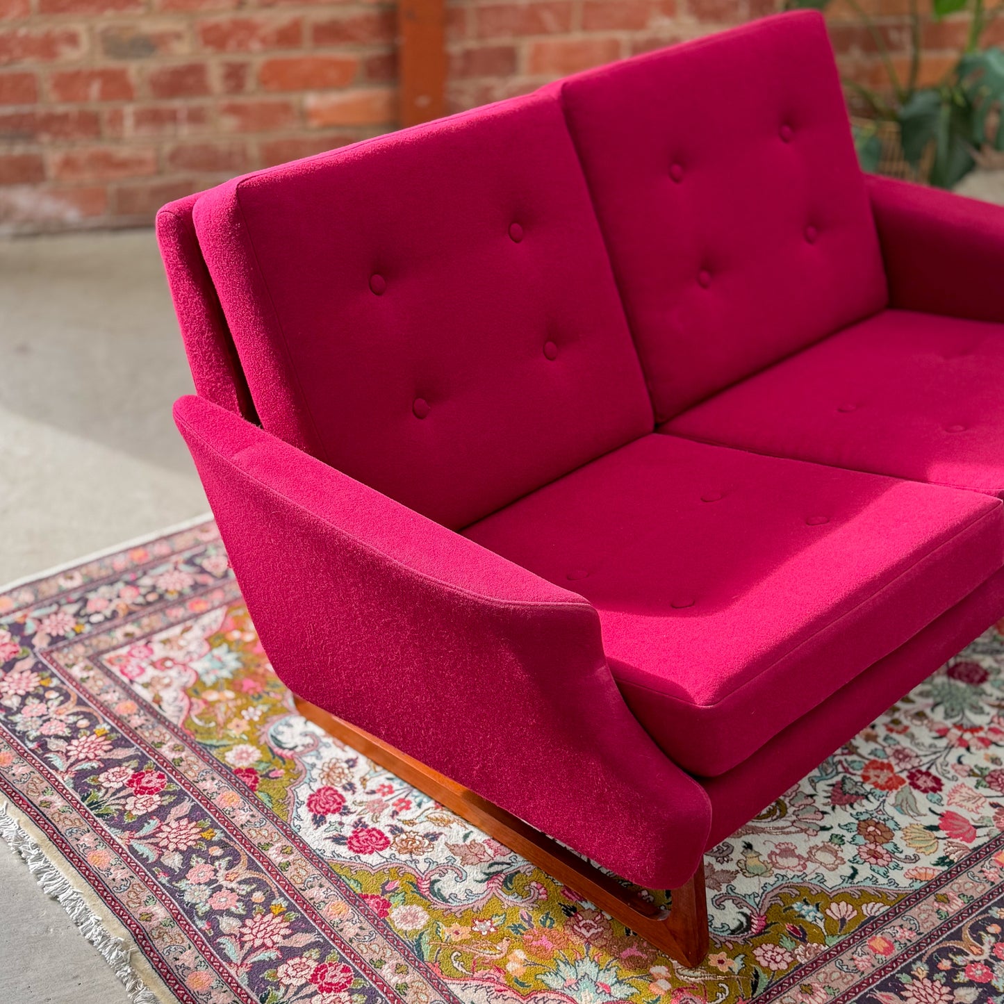 1960s Parker two seater sofa on a sleigh base with exposed dowel detail